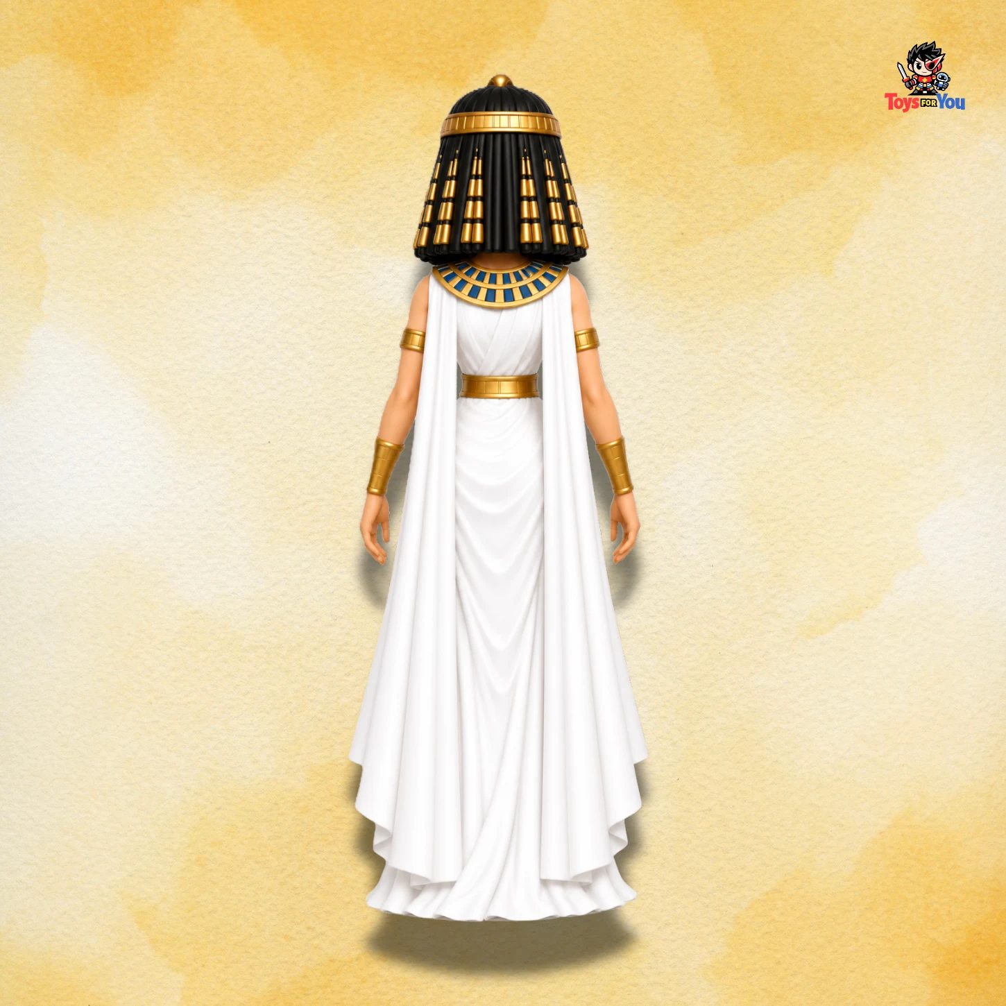 Backview of Cleopatra action figure showing white flowing gown and Egyptian-inspired accessories.